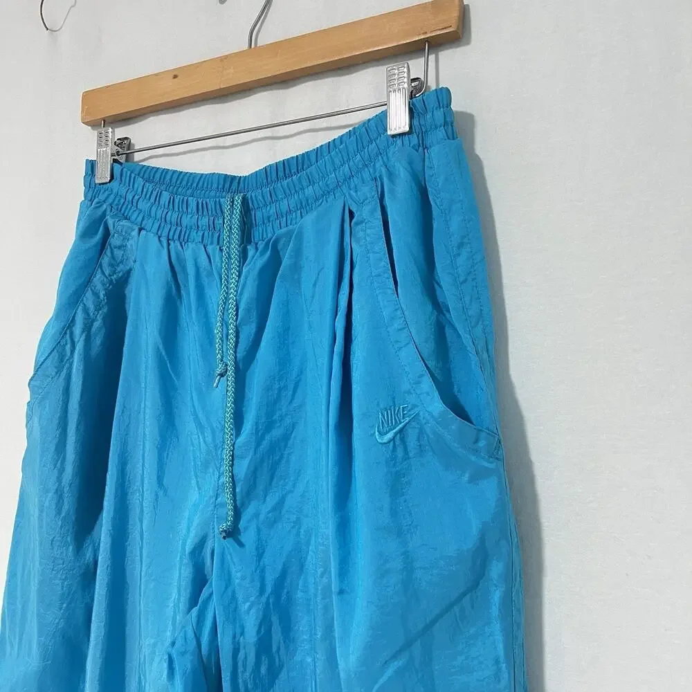 Vintage Nike Women’s Teal Nylon Windbreaker Track Pants Size L Lined 90’s